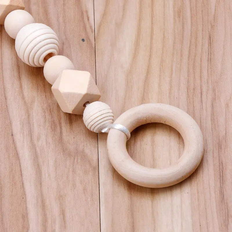 Baby Play Gym Accessorie Chew Wooden Beads DIY Teether Jewelry Nursing Pendants Baby Toys Rattle Teether 95AE
Baby Play Gym Accessorie Chew Wooden Beads DIY Teether Jewelry Nursing Pendants Baby Toys Rattle Teether 95AE