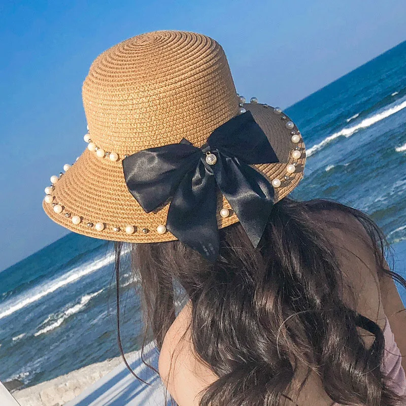 2018 New Summer pearl beading Shading sun hat Lady beach hat vacation fashion girls wide brim straw hat 
2018 New Summer pearl beading Shading sun hat Lady beach hat vacation fashion girls wide brim straw hat