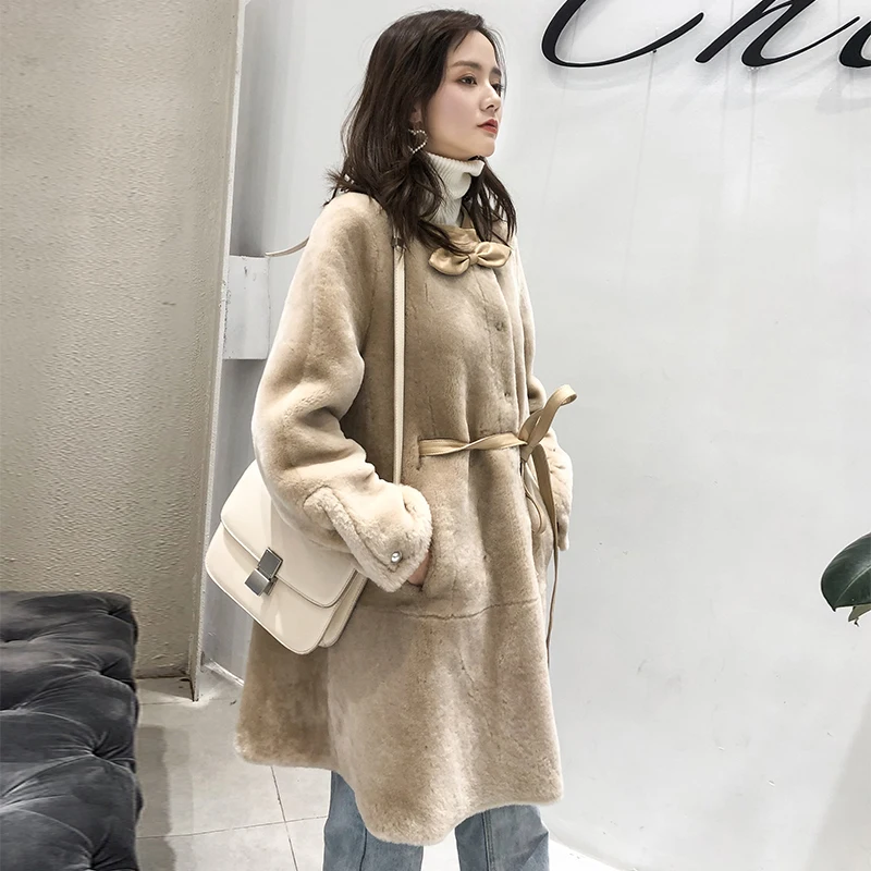 MENINA BONITA Fashion Single-breasted O-Neck Bow Winter Jacket Women Belt Coat Real Natural Mink Fur Warm Outerwear Streetwear
MENINA BONITA Fashion Single-breasted O-Neck Bow Winter Jacket Women Belt Coat Real Natural Mink Fur Warm Outerwear Streetwear