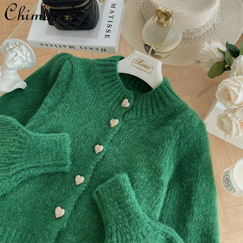 French Retro Heart Buckle Decorative Cardigan 2021 Fall Women's Clothing New Fashion Puff Sleeve Elegant Sweater Feminine
French Retro Heart Buckle Decorative Cardigan 2021 Fall Women's Clothing New Fashion Puff Sleeve Elegant Sweater Feminine