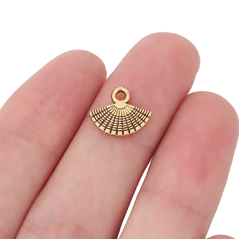30 x Antique Gold Fan Charms Pendants Craft for Necklace Bracelet Jewelry Making Accessories 13x11mm
30 x Antique Gold Fan Charms Pendants Craft for Necklace Bracelet Jewelry Making Accessories 13x11mm