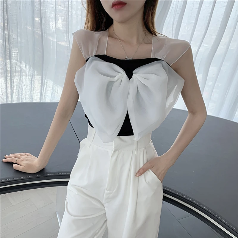 Fasion Summer Korean Version of The Sling Design A Big Bow Small Vest Short Casual Vest Chiffon Vest
Fasion Summer Korean Version of The Sling Design A Big Bow Small Vest Short Casual Vest Chiffon Vest