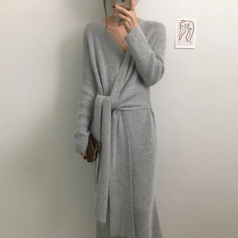 Korean Chic Autumn Winter New Loose Apricot V-neck Cross Side Strap Waist Knitted Sweater Dress Women Fashion 2021 X847
Korean Chic Autumn Winter New Loose Apricot V-neck Cross Side Strap Waist Knitted Sweater Dress Women Fashion 2021 X847