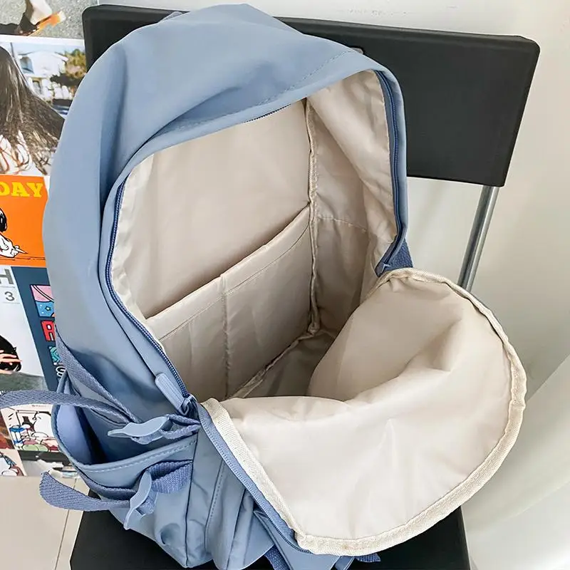 Fashionable Badge Girl's Backpack Large capacity Nylon waterproof cloth bag Japanese College style New Schoolbag Travel bag Tide
Fashionable Badge Girl's Backpack Large capacity Nylon waterproof cloth bag Japanese College style New Schoolbag Travel bag Tide