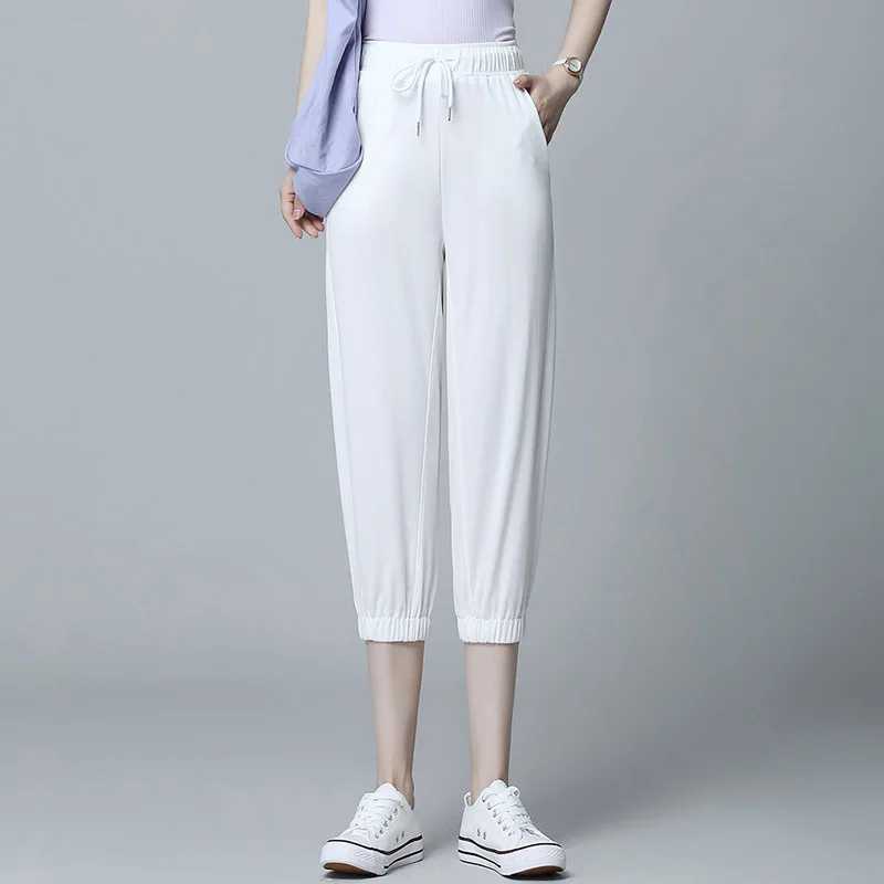 Solid High Waist Drawstring Women Sweatpants Loose Cool Ice Silk Korean Stretch High Quality Calf Length Summer Harem Trousers
Solid High Waist Drawstring Women Sweatpants Loose Cool Ice Silk Korean Stretch High Quality Calf Length Summer Harem Trousers