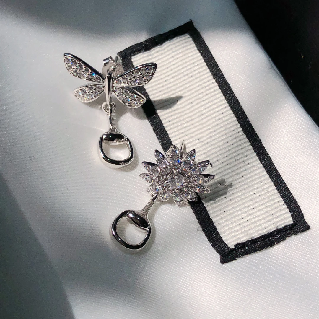 925 sterling silver earrings, asymmetrical female earrings; dancing butterflies, classic micro-label 1:1
925 sterling silver earrings, asymmetrical female earrings; dancing butterflies, classic micro-label 1:1