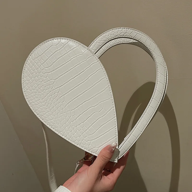 Solid Color Heart Shape Shoulder Crossbody Bags For Women Fashion PU Leather Women's Designer Handbag Female Travel Small Bag
Solid Color Heart Shape Shoulder Crossbody Bags For Women Fashion PU Leather Women's Designer Handbag Female Travel Small Bag