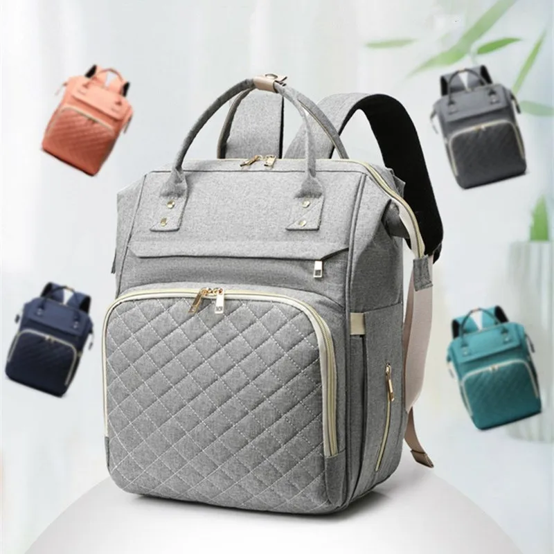 Baby Diaper Bag Bed Backpack Mommy Maternity Bag Multifunction Stroller Nappy Bag Large Capacity Nursing Bag for Baby Care
Baby Diaper Bag Bed Backpack Mommy Maternity Bag Multifunction Stroller Nappy Bag Large Capacity Nursing Bag for Baby Care