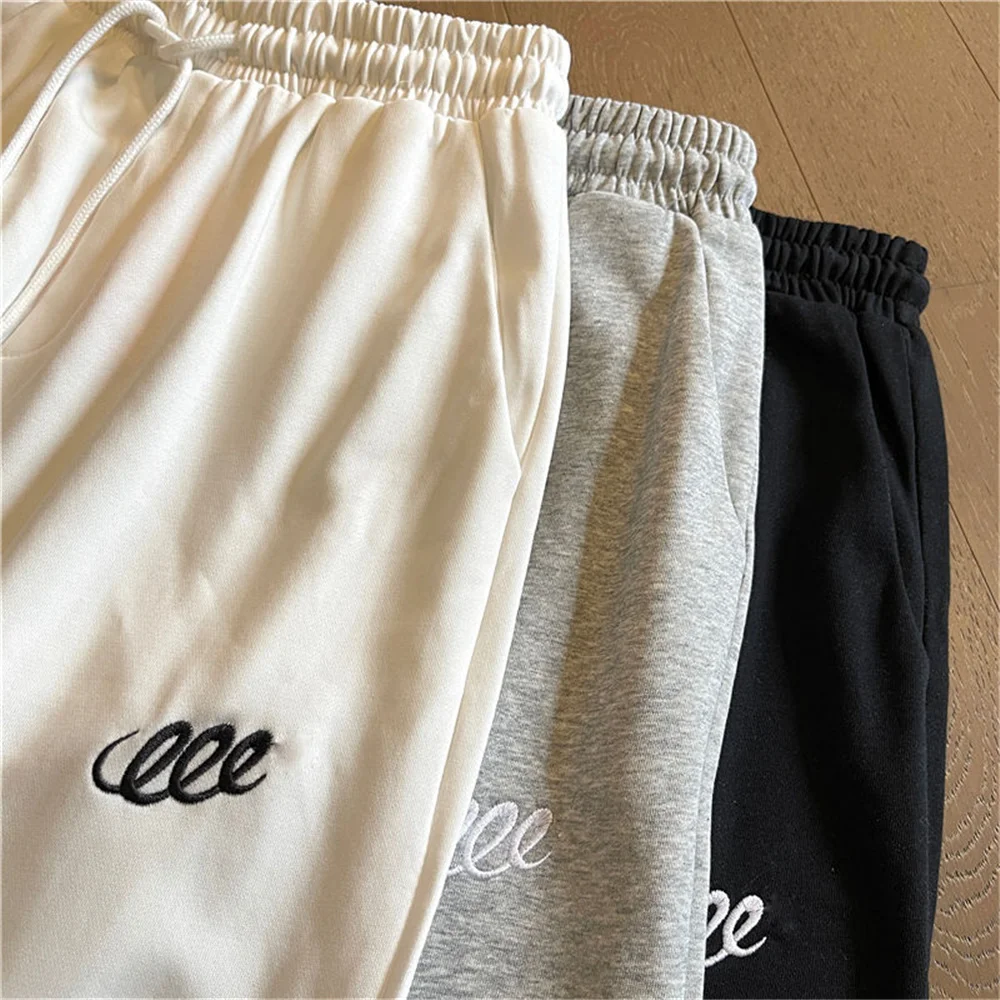 Embroidered Solid Color Elasticated High-Waist Drawstring Sports Pant Women Korean Fashion Bloomers Joggers Casual Black Trouser
Embroidered Solid Color Elasticated High-Waist Drawstring Sports Pant Women Korean Fashion Bloomers Joggers Casual Black Trouser