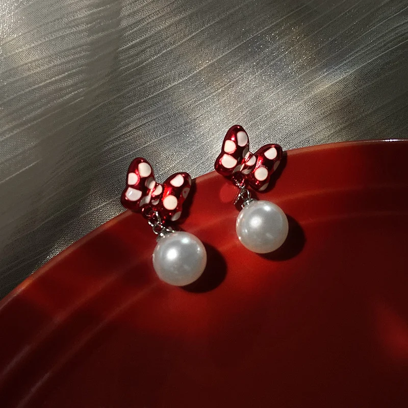 925 silver needle fashion bow Pearl Earrings net red personality Earrings cute girl heart small earrings
925 silver needle fashion bow Pearl Earrings net red personality Earrings cute girl heart small earrings