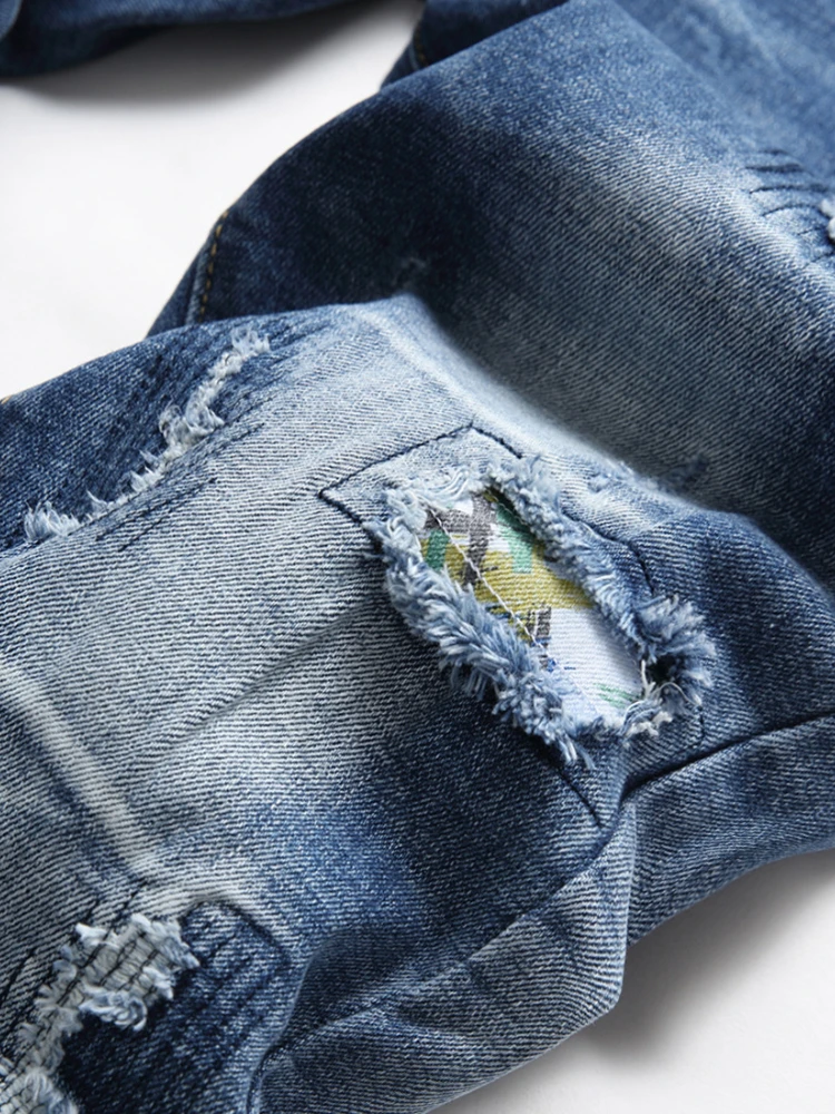 European and American fashion trendy men's stretch slim-fitting small straight-leg jeans with multiple holes stacked jeans
European and American fashion trendy men's stretch slim-fitting small straight-leg jeans with multiple holes stacked jeans