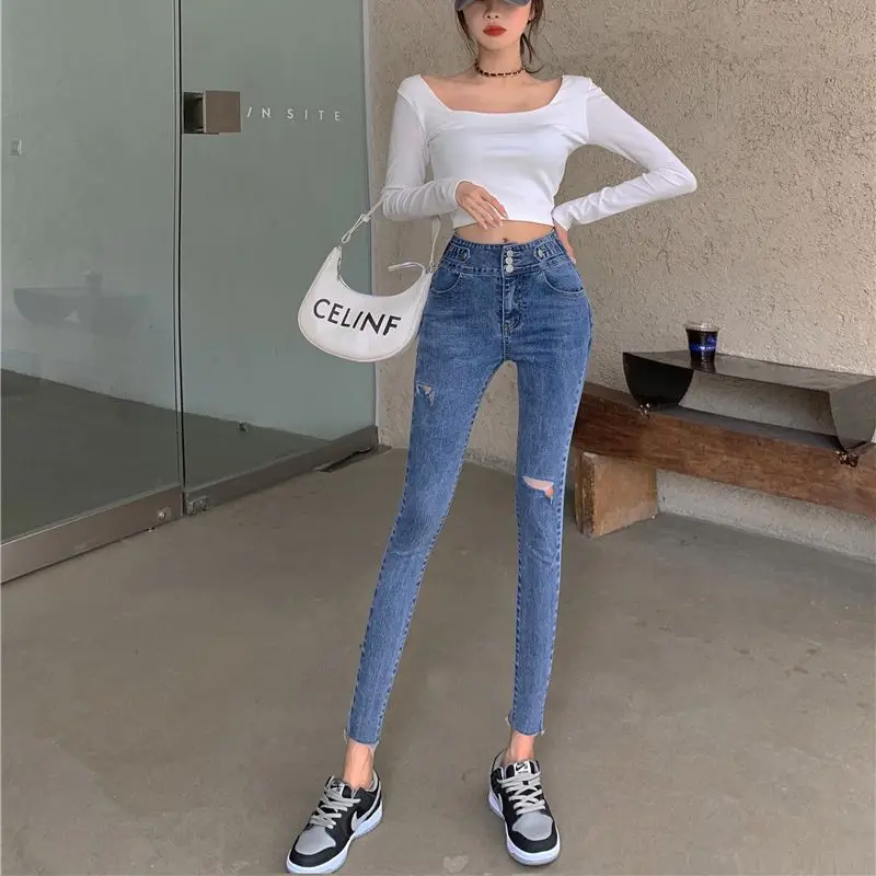 China's new women's pants personality fashion hole high waist stretch jeans pencil pants spot
China's new women's pants personality fashion hole high waist stretch jeans pencil pants spot