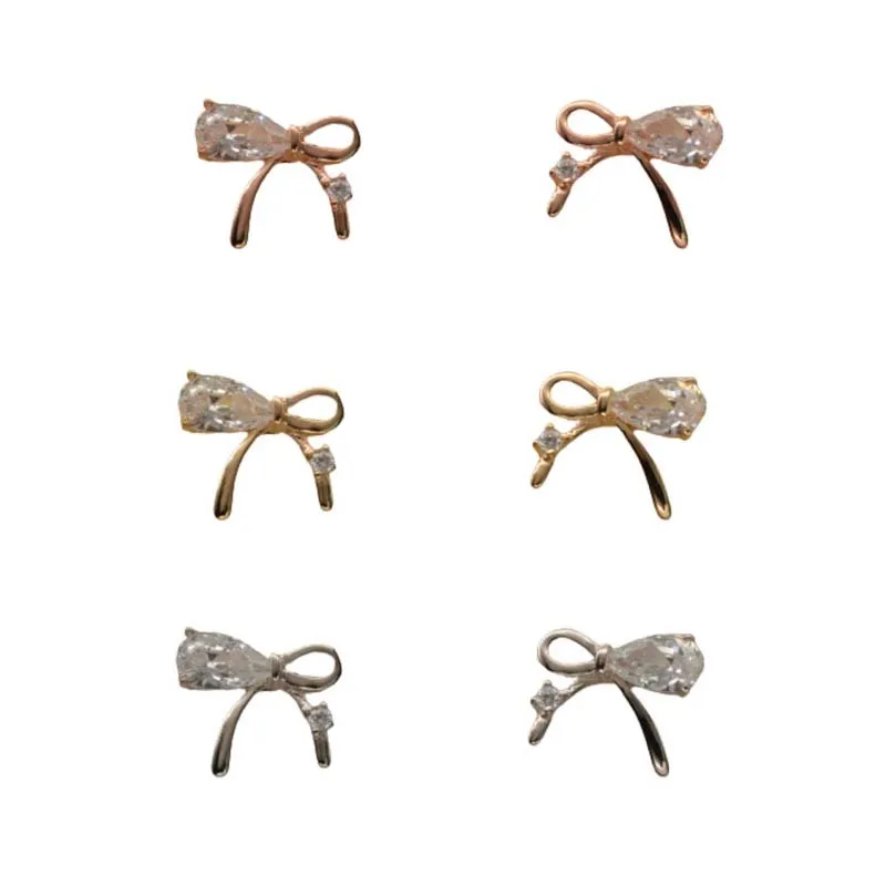 2021 new style inlaid zirconium bow earrings simple Korean fashion earrings earrings women 
2021 new style inlaid zirconium bow earrings simple Korean fashion earrings earrings women