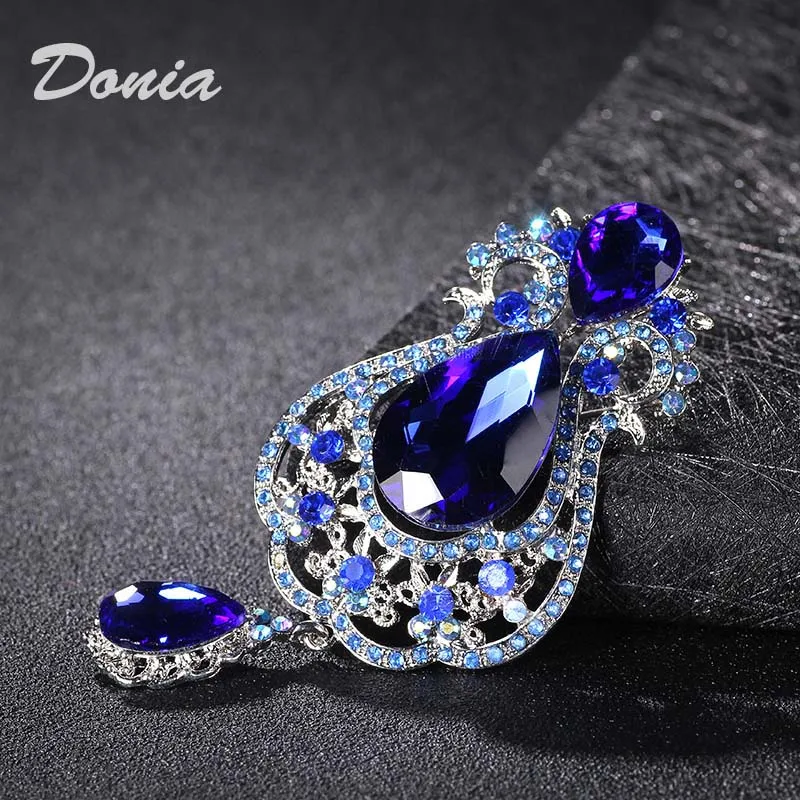 Donia jewelry Europe and the United States high-grade large pendant drop large glass alloy brooch bridal dress brooch coat pin
Donia jewelry Europe and the United States high-grade large pendant drop large glass alloy brooch bridal dress brooch coat pin