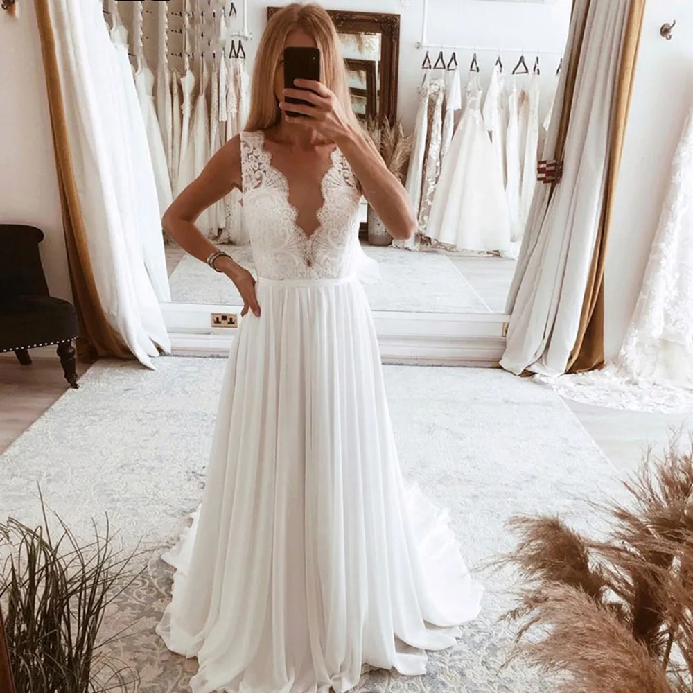 Bohemian A Line Chiffon Wedding Dresses 2021 Lace Appliques V Neck White Dress For Women Vestidos De Noiva Sleeveless Bridal
Bohemian A Line Chiffon Wedding Dresses 2021 Lace Appliques V Neck White Dress For Women Vestidos De Noiva Sleeveless Bridal
