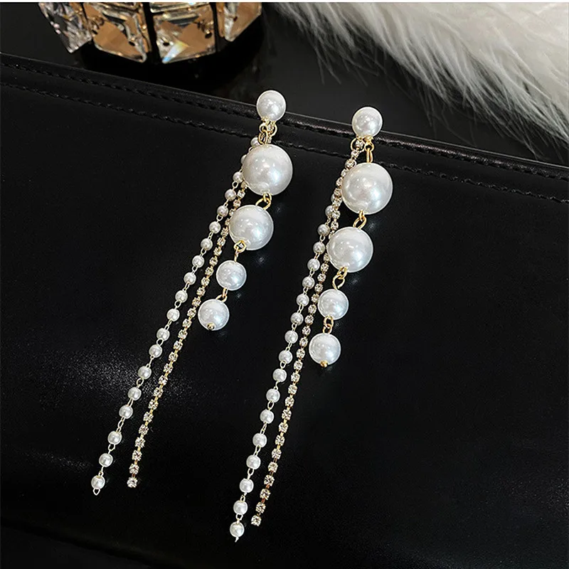 S925 Silver Needle Pearl Tassel Earrings Drop Earrings for Women Two Pc Korean Earring Fashion Jewelry 2021 New Ear Pendant
S925 Silver Needle Pearl Tassel Earrings Drop Earrings for Women Two Pc Korean Earring Fashion Jewelry 2021 New Ear Pendant