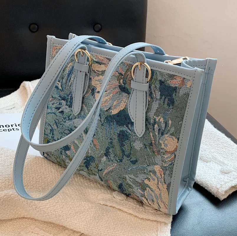 2021 New Fashion Ladies Autumn All-match One-shoulder Underarm Bag Portable Oil Painting Tote Bag High-quality Niche Design
2021 New Fashion Ladies Autumn All-match One-shoulder Underarm Bag Portable Oil Painting Tote Bag High-quality Niche Design