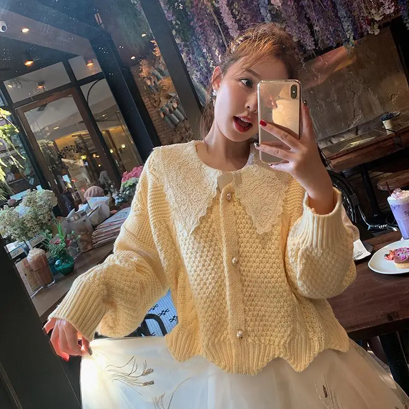 Women's solid color short autumn cardigan sweater new wave side loose doll collar autumn winter button knitted sweater girl
Women's solid color short autumn cardigan sweater new wave side loose doll collar autumn winter button knitted sweater girl