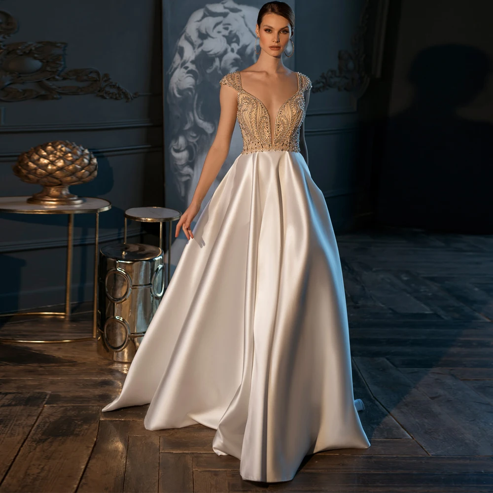 Vestidos Elegant Wedding Dresses Satin Appliques Lace V-Neck Sleeveless Zipper A-Line Sweep Train Bridal Gowns
Vestidos Elegant Wedding Dresses Satin Appliques Lace V-Neck Sleeveless Zipper A-Line Sweep Train Bridal Gowns