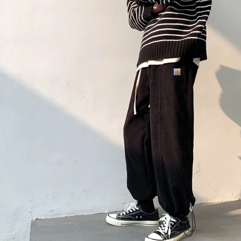 Весенне-осенние мужские и женские вельветовые брюки японская рабочая одежда Свободные повседневные брюки со шнурком, прямые брюки 2021
Весенне-осенние мужские и женские вельветовые брюки японская рабочая одежда Свободные повседневные брюки со шнурком, прямые брюки 2021