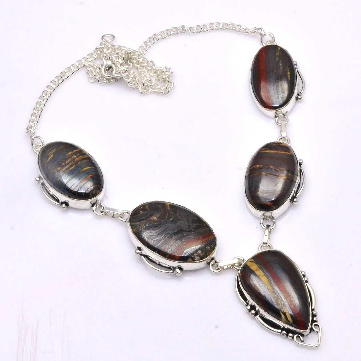 Genuine Iron Tiger Eye Silver Overlay over Copper, 50 cm , N4571
Genuine Iron Tiger Eye Silver Overlay over Copper, 50 cm , N4571