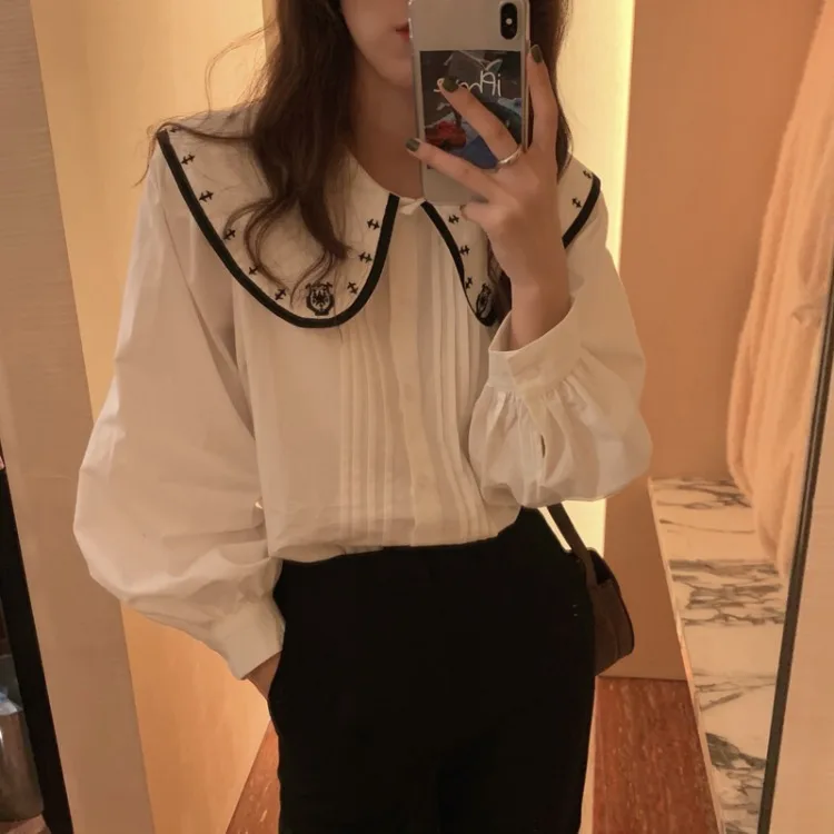 Spring Korean new style embroidered doll collar college wind pressure pleated all-match puff sleeve shirt Simple Pleated
Spring Korean new style embroidered doll collar college wind pressure pleated all-match puff sleeve shirt Simple Pleated