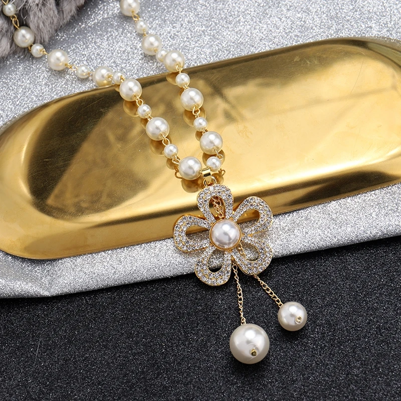 Fashion Flower Pearl Tassel Long Necklace For Women 2020 New Jewelry Elegant Dress Sweater Chains Accessories
Fashion Flower Pearl Tassel Long Necklace For Women 2020 New Jewelry Elegant Dress Sweater Chains Accessories