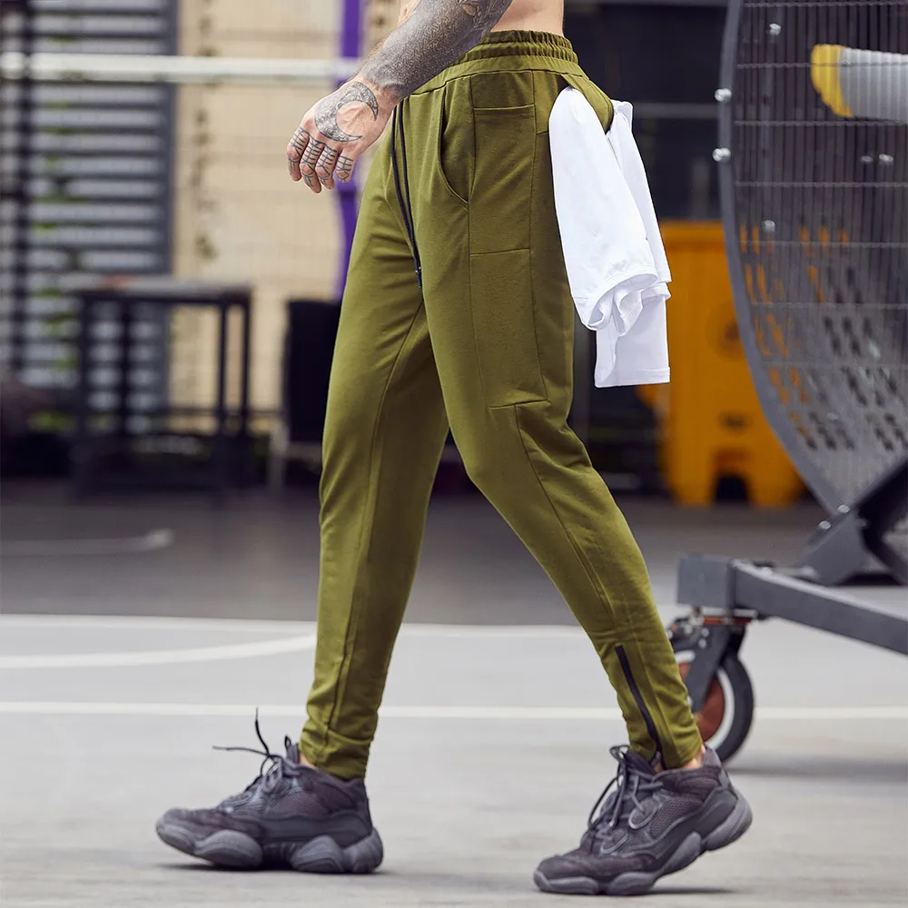 2020 Autumn Men Sports Trousers Casual Elastic Waist Cuffed Feet Tapered Zipper Fitness Slim Leggings Pants Solid Color
2020 Autumn Men Sports Trousers Casual Elastic Waist Cuffed Feet Tapered Zipper Fitness Slim Leggings Pants Solid Color