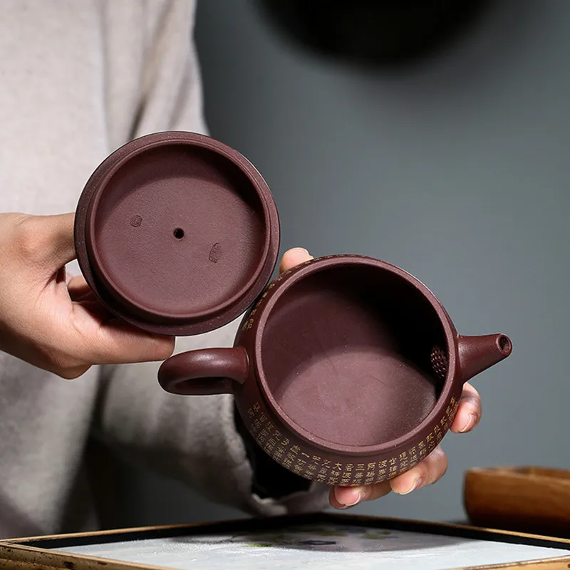 250ml Yixing Boutique Purple Clay Teapots Heart Sutra Tea Pot Raw Ore Beauty Kettle Master Handmade Tea Set Customized Authentic
250ml Yixing Boutique Purple Clay Teapots Heart Sutra Tea Pot Raw Ore Beauty Kettle Master Handmade Tea Set Customized Authentic