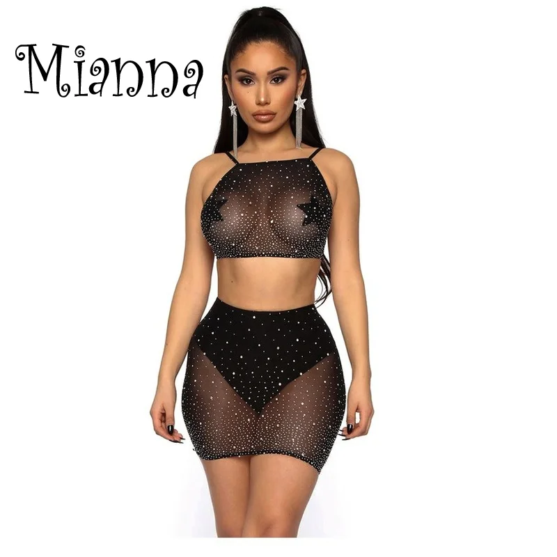 Women Hollow Out Mesh 2 Pieces Set Shiny Rhinestone Halter Crop Top Sexy Sheer Mini Skirt Summer Beach Cover Up Clubwear
Women Hollow Out Mesh 2 Pieces Set Shiny Rhinestone Halter Crop Top Sexy Sheer Mini Skirt Summer Beach Cover Up Clubwear