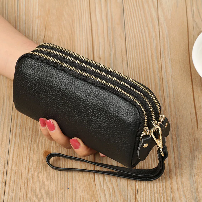 The first layer of cowhide 2021 new three-layer women's clutch long wallet multifunctional leather mobile phone bag coin purse 
The first layer of cowhide 2021 new three-layer women's clutch long wallet multifunctional leather mobile phone bag coin purse