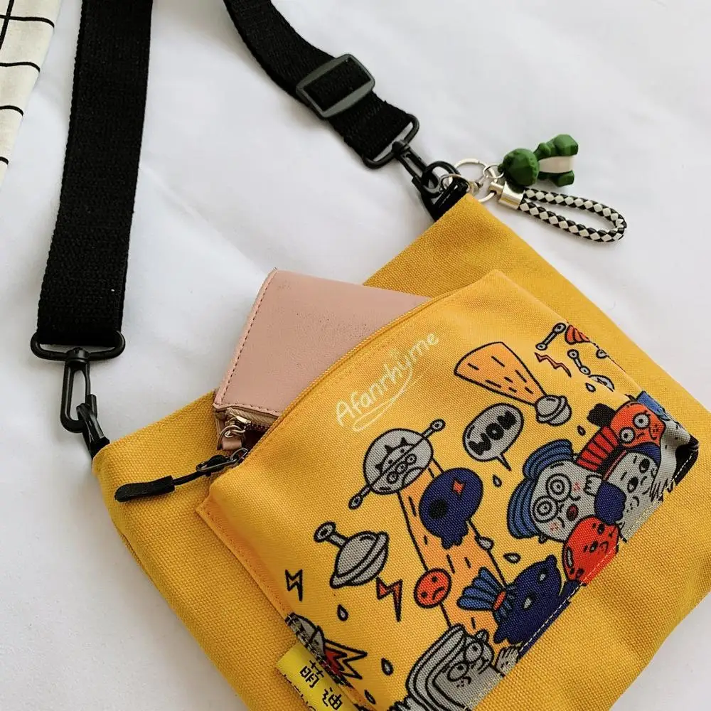 Animation printing women canvas bag comfortable shoulder bags Casual crossbody bags Multilayer space Messenger bag trend bags
Animation printing women canvas bag comfortable shoulder bags Casual crossbody bags Multilayer space Messenger bag trend bags