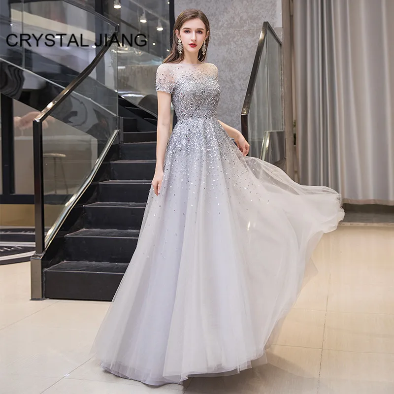فساتين سهره فاخره 2023 Formal Dress Jewel Collar Robe De Soiree Short Sleeves Crystal Beaded Gown Gray A Line Evening Dresses
فساتين سهره فاخره 2023 Formal Dress Jewel Collar Robe De Soiree Short Sleeves Crystal Beaded Gown Gray A Line Evening Dresses
