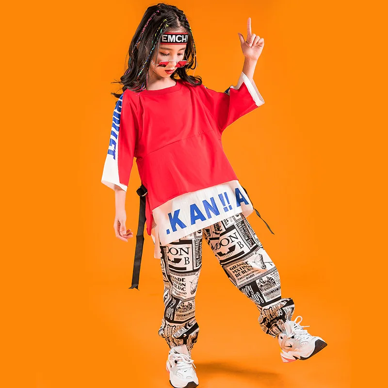Boy's hip-hop fashion, big T-shirt, girl's printed pants, jazz dance clothes, street clothes
Boy's hip-hop fashion, big T-shirt, girl's printed pants, jazz dance clothes, street clothes