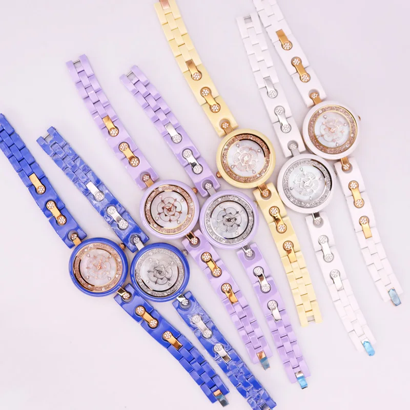 ROTATING ROSE CAMELLIA FLOWER MELISSA LADY WOMEN'S WATCH FASHION CERAMIC BRACELET RHINESTONE LUXURY CRYSTAL GIRL BIRTHDAY GIFT 
ROTATING ROSE CAMELLIA FLOWER MELISSA LADY WOMEN'S WATCH FASHION CERAMIC BRACELET RHINESTONE LUXURY CRYSTAL GIRL BIRTHDAY GIFT