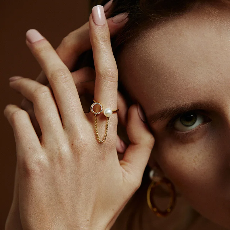 Popular Golden Long Chain Line Tassel Hollow Circle White Imitation Pearl Ladies Adjustable Open Ring for Women Party Jewelry
Popular Golden Long Chain Line Tassel Hollow Circle White Imitation Pearl Ladies Adjustable Open Ring for Women Party Jewelry