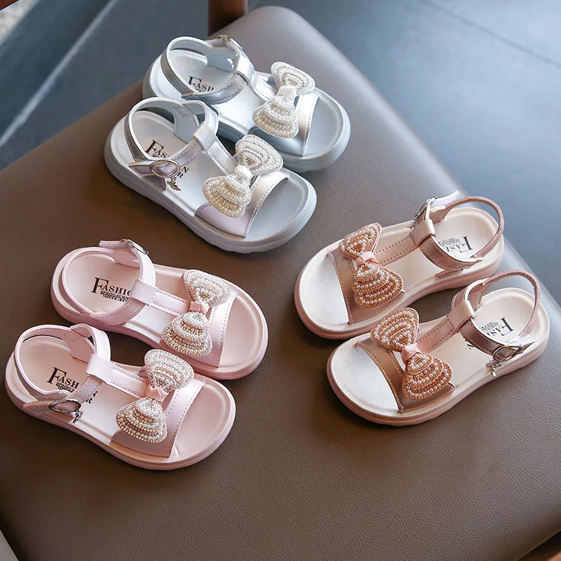 Shoes Child Girl Summer 2021 Sandals for Teenagers Girls Fashion Pearl Bow Tie Baby Girl Dance Shoes Holiday Beach Shoes E02162
Shoes Child Girl Summer 2021 Sandals for Teenagers Girls Fashion Pearl Bow Tie Baby Girl Dance Shoes Holiday Beach Shoes E02162