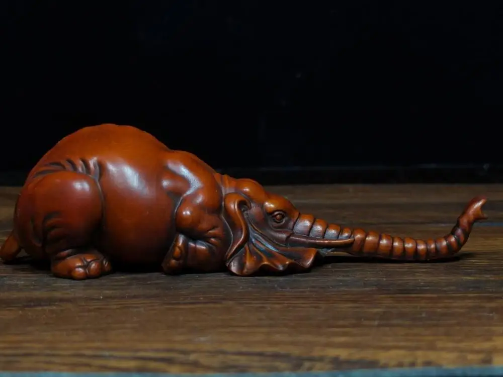 wedding decoration Chinese Boxwood Seikos Wood Carving Elephant statue with long nose Baby elephant nose wood carving
wedding decoration Chinese Boxwood Seikos Wood Carving Elephant statue with long nose Baby elephant nose wood carving