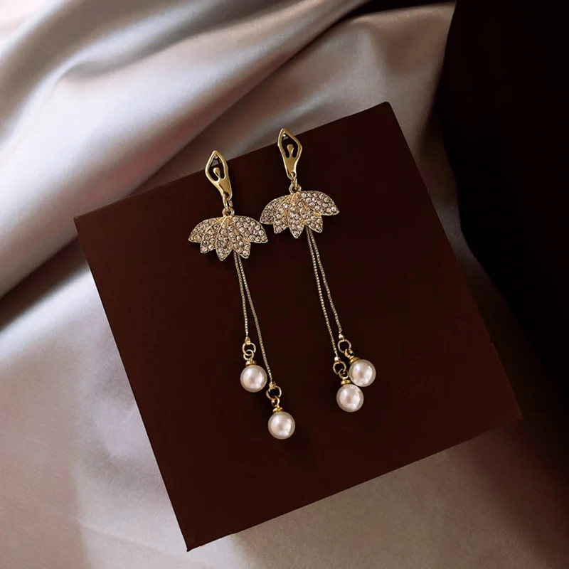 YAOLOGE Elegant Character Drop Ballet Earrings Female Elegant Temperament Long Earrings Pearl Rhinestone Golden Jewelry Gift
YAOLOGE Elegant Character Drop Ballet Earrings Female Elegant Temperament Long Earrings Pearl Rhinestone Golden Jewelry Gift