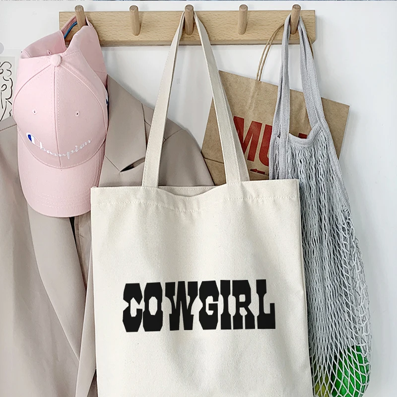 Harajuku COWGIRL letter print canvas bag large capacity Vintage new cartoon ins Women shopper bag casual chic women shoulder bag
Harajuku COWGIRL letter print canvas bag large capacity Vintage new cartoon ins Women shopper bag casual chic women shoulder bag