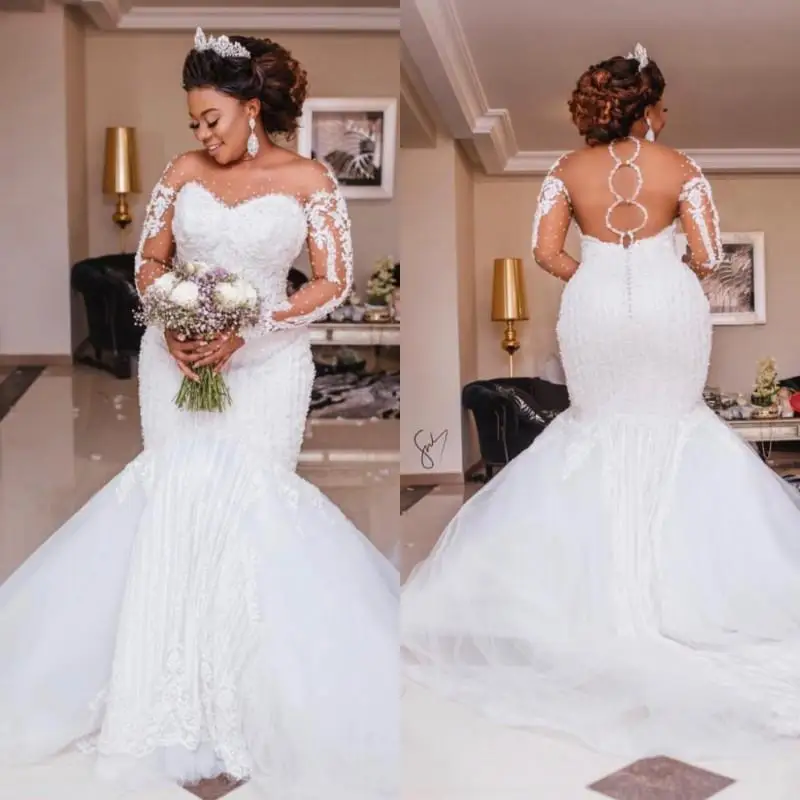 Verngo South African Mermaid Lace Pattern Beads Wedding Dress Long Sleeves Sheer Neck Sweep Train Modern Bridal Gowns Plus Size
Verngo South African Mermaid Lace Pattern Beads Wedding Dress Long Sleeves Sheer Neck Sweep Train Modern Bridal Gowns Plus Size