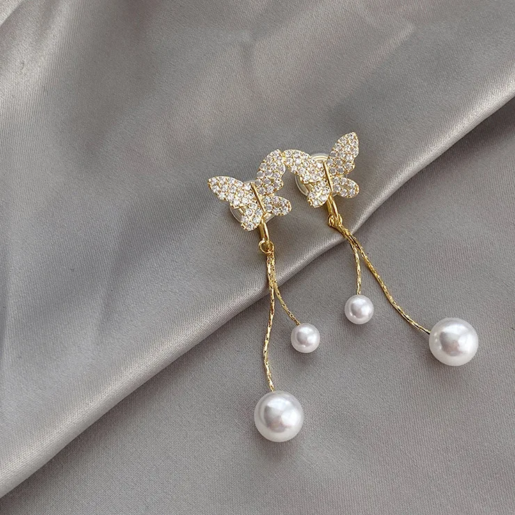 Butterfly Pearl Long Ear Clip Non-Pierced Female Summer Tassel High-Grade Temperament Painless Invisible Mosquito Coil Earrings
Butterfly Pearl Long Ear Clip Non-Pierced Female Summer Tassel High-Grade Temperament Painless Invisible Mosquito Coil Earrings