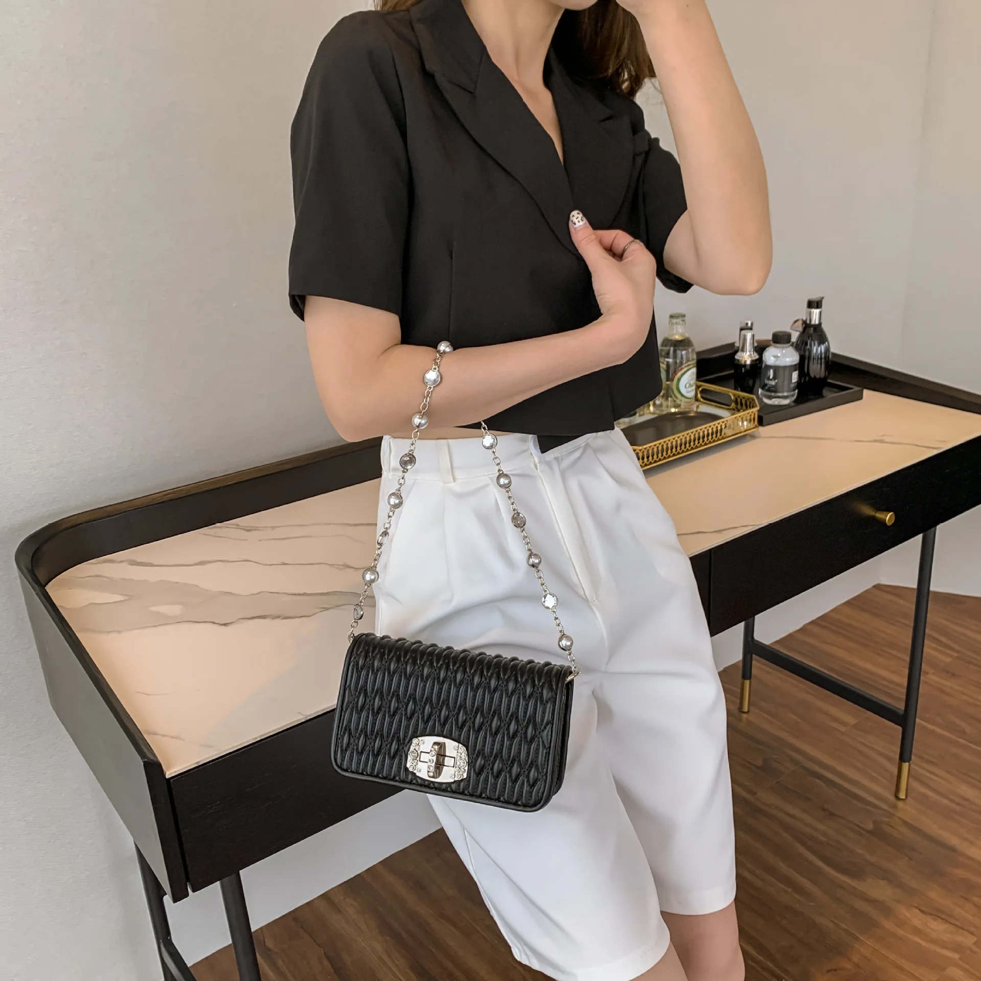 New portable small square bag trendy fashion portable pearl chain ladies fold messenger shoulder bag
New portable small square bag trendy fashion portable pearl chain ladies fold messenger shoulder bag