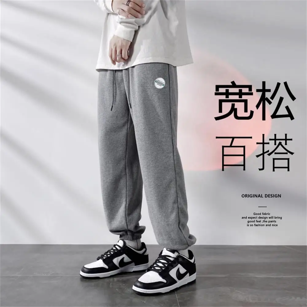 Fashionable Men's Trousers Korean Version of The Trend of Loose Lace-up Footwear Pants S-4XL Solid Color Sports Casual Pants Men
Fashionable Men's Trousers Korean Version of The Trend of Loose Lace-up Footwear Pants S-4XL Solid Color Sports Casual Pants Men