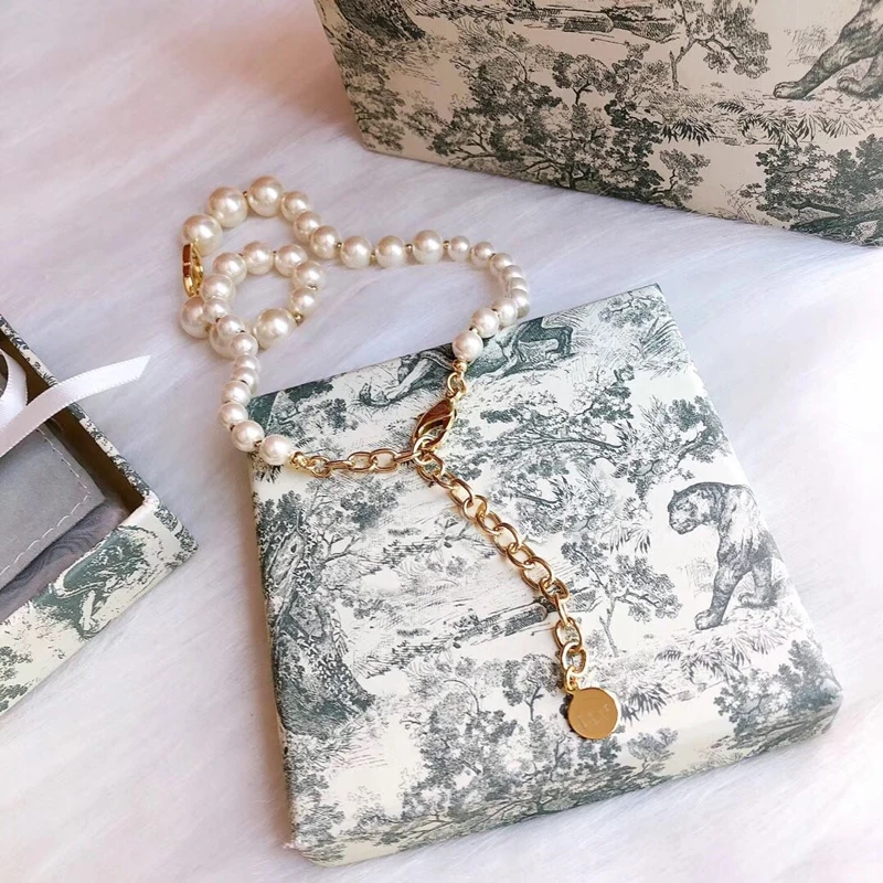 C2066 European and American lace collar letter neck band imitation pearl clavicle necklace wedding jewelry
C2066 European and American lace collar letter neck band imitation pearl clavicle necklace wedding jewelry