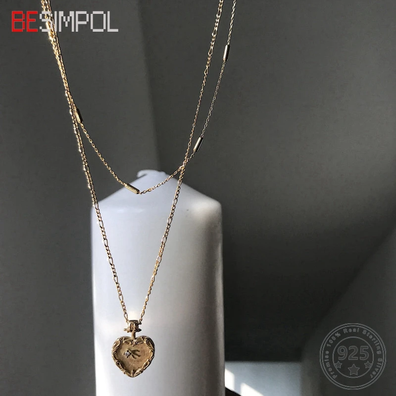 Besimpol 925 Sterling Silver Heart Double Layer Necklace Elegant Gold Zircon Heart Pendant Necklace for Women Fine Jewelry Gifts
Besimpol 925 Sterling Silver Heart Double Layer Necklace Elegant Gold Zircon Heart Pendant Necklace for Women Fine Jewelry Gifts