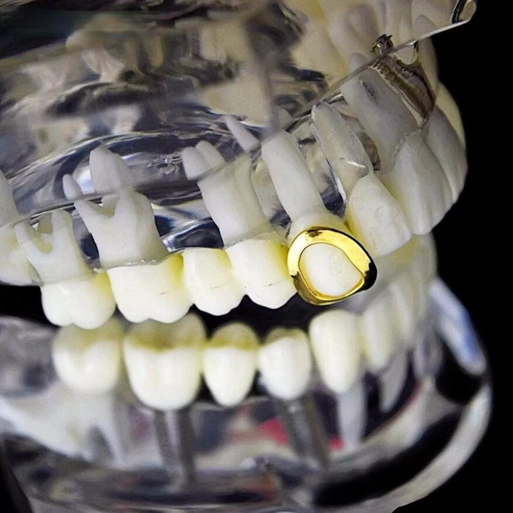 Geel Gold Plated Hollow Open Gezicht Grillz Enkele Tanden Cap Hip Hop Tand Grills Voor Gift
Geel Gold Plated Hollow Open Gezicht Grillz Enkele Tanden Cap Hip Hop Tand Grills Voor Gift