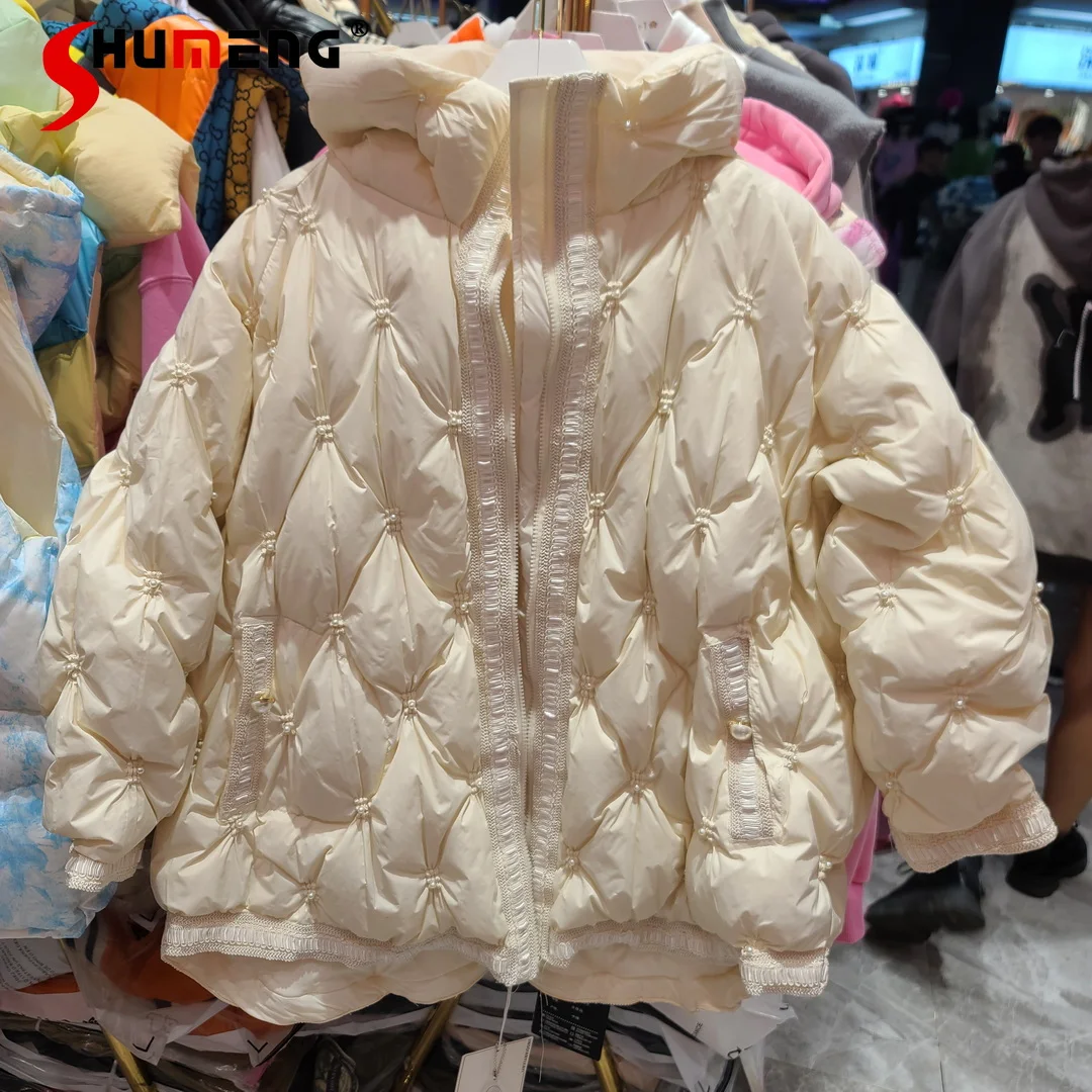 2021 Winter New Female European Light Luxury Pearl Embroidery Fluffy Down Coat Women's Fashion Streetwear Hooded Down Jacket
2021 Winter New Female European Light Luxury Pearl Embroidery Fluffy Down Coat Women's Fashion Streetwear Hooded Down Jacket