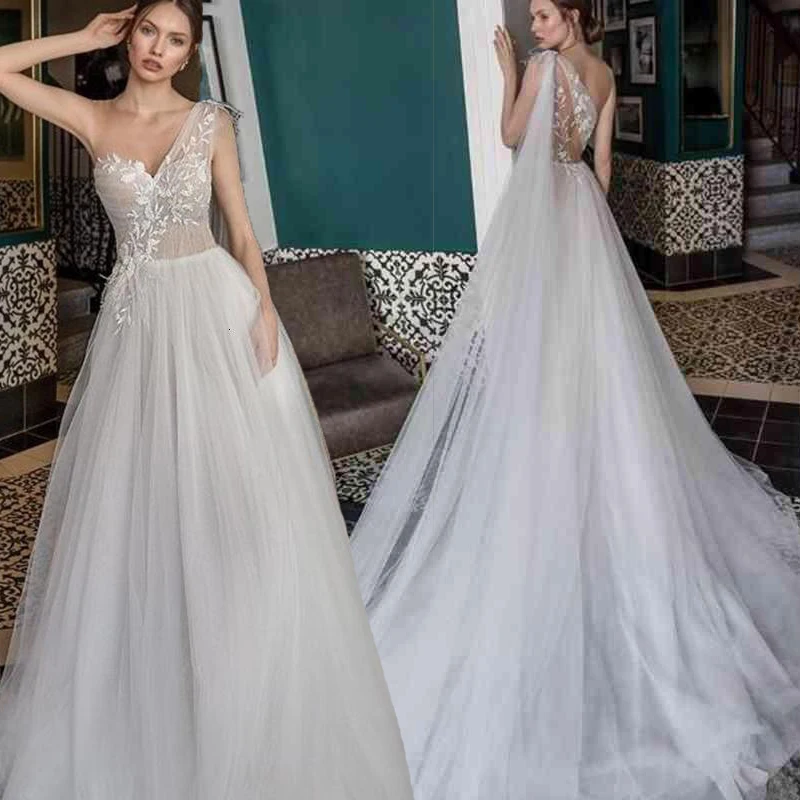 Beach Wedding Dresses 2021 A Line Lace Appliqued Beads Sweep Train Boho Tulle White Summer Dress One Shoulder Sexy Bridal Gown
Beach Wedding Dresses 2021 A Line Lace Appliqued Beads Sweep Train Boho Tulle White Summer Dress One Shoulder Sexy Bridal Gown