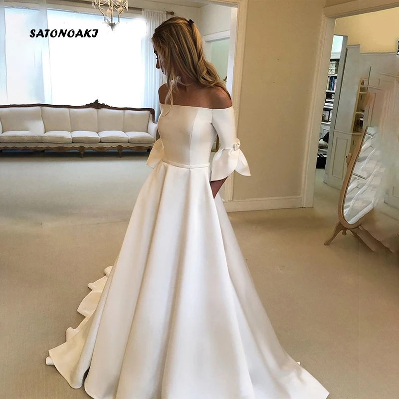 Sexy Strapless Satin Empire Wedding Dress 2020 Cute Bow Four Petals Flare Sleeve Button Court Train Bridal Gown Vestido De Novia
Sexy Strapless Satin Empire Wedding Dress 2020 Cute Bow Four Petals Flare Sleeve Button Court Train Bridal Gown Vestido De Novia